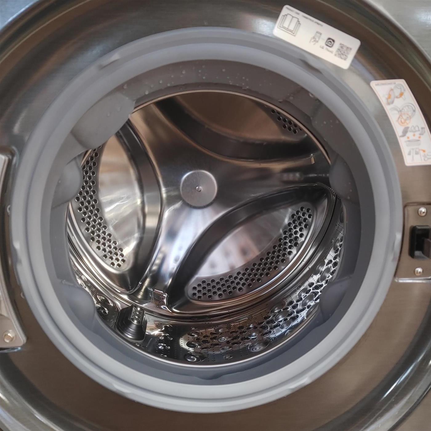 LG WT1210BBF.APBQKIS lavasciuga Libera installazione Caricamento frontale Nero A