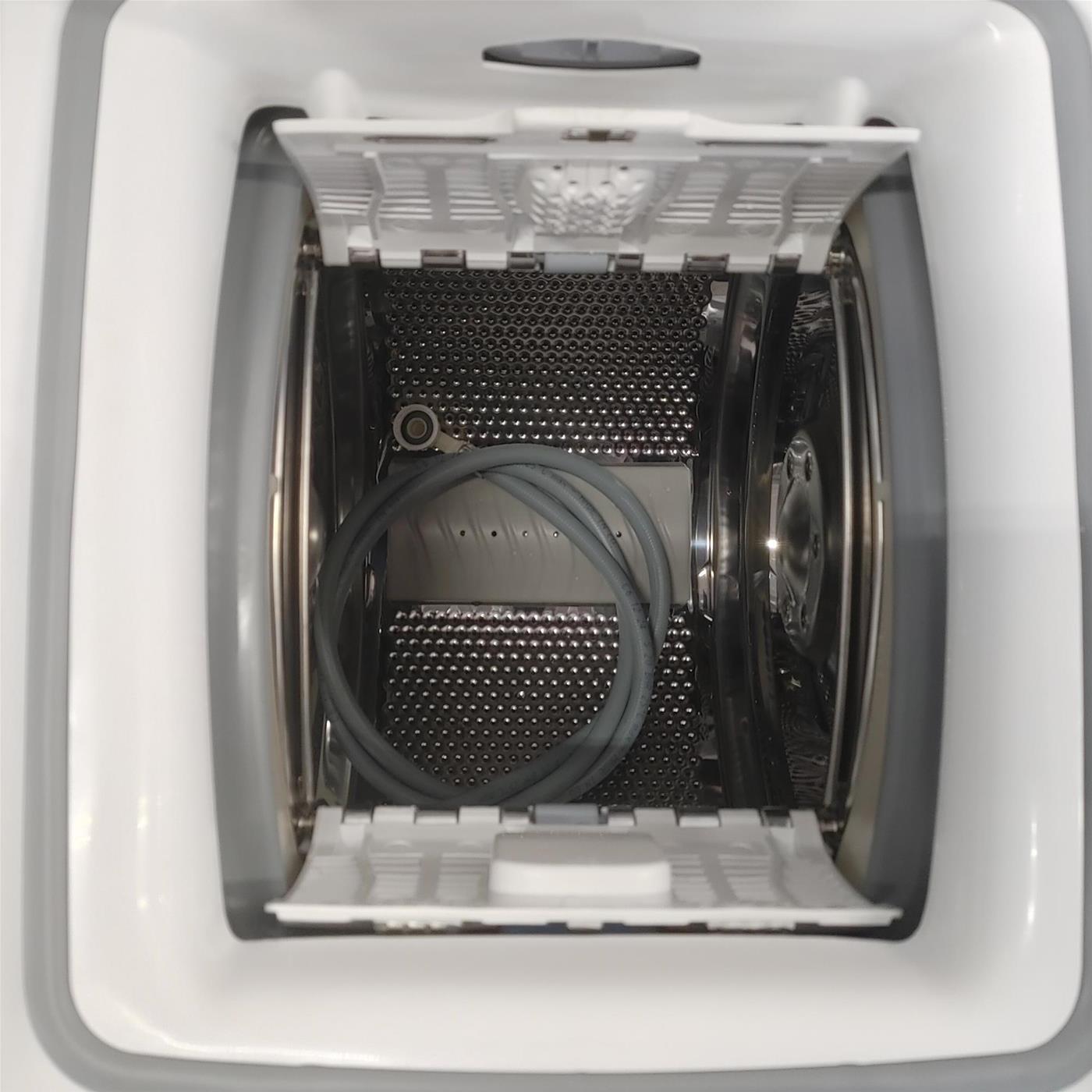 Candy Smart Inverter CSTG 47TMV5/1-11 lavatrice Caricamento dall'alto 7 kg 1400 Giri/min Bianco