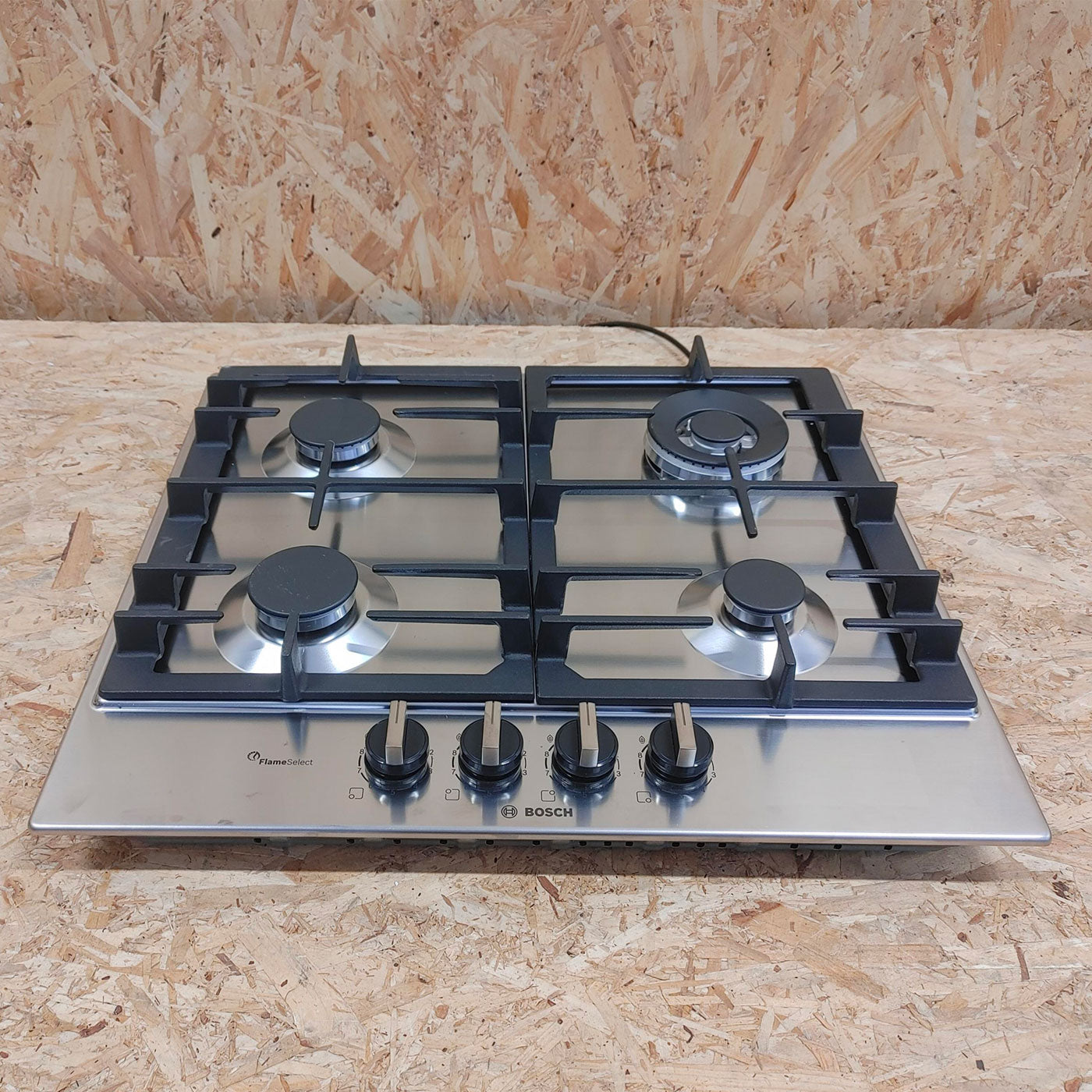 Bosch Serie 6 PCH6A5B90 piano cottura Nero, Acciaio inossidabile Da incasso Gas 4 Fornello(i)
